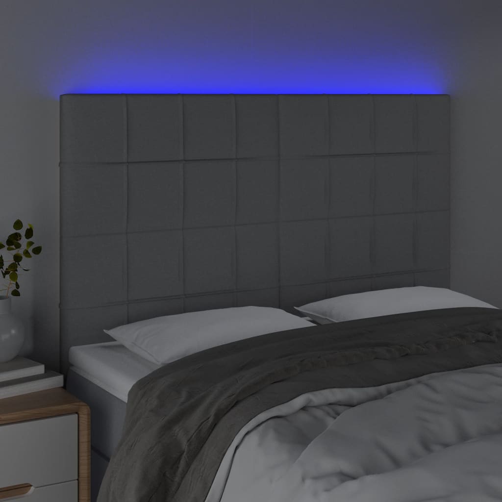 sengegavl med LED-lys 144x5x118/128 cm stof lysegrå