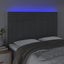 sengegavl med LED-lys 144x5x118/128 cm stof mørkegrå