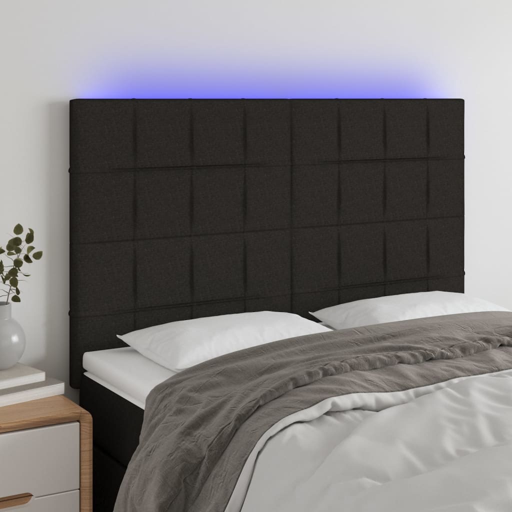 sengegavl med LED-lys 144x5x118/128 cm stof sort