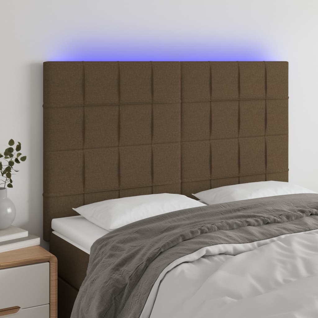 sengegavl med LED-lys 144x5x118/128 cm stof mørkebrun
