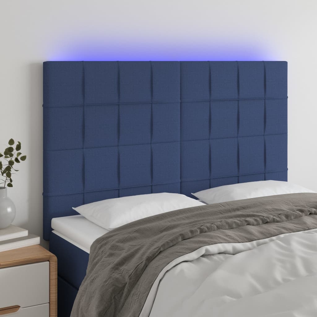 sengegavl med LED-lys 144x5x118/128 cm stof blå