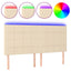 sengegavl med LED-lys 200x5x118/128 cm stof Cremefarvet