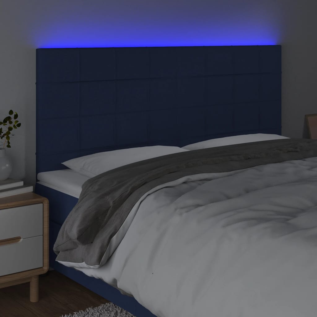sengegavl med LED-lys 200x5x118/128 cm stof blå