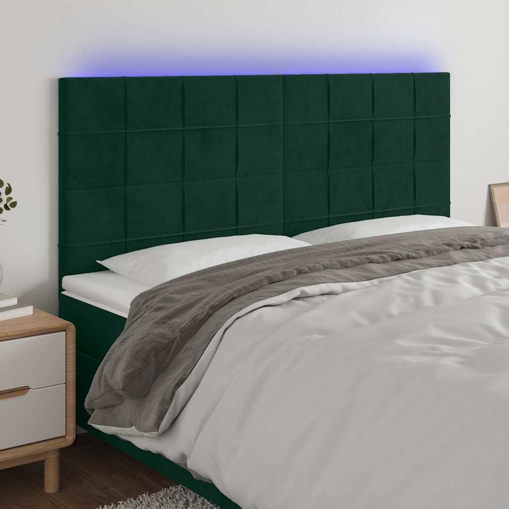 sengegavl med LED-lys 160x5x118/128 cm fløjl mørkegrøn
