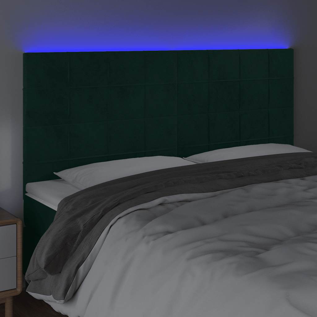 sengegavl med LED-lys 180x5x118/128 cm fløjl mørkegrøn
