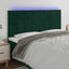 sengegavl med LED-lys 180x5x118/128 cm fløjl mørkegrøn