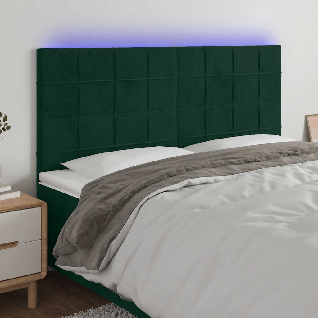 sengegavl med LED-lys 200x5x118/128 cm fløjl mørkegrøn