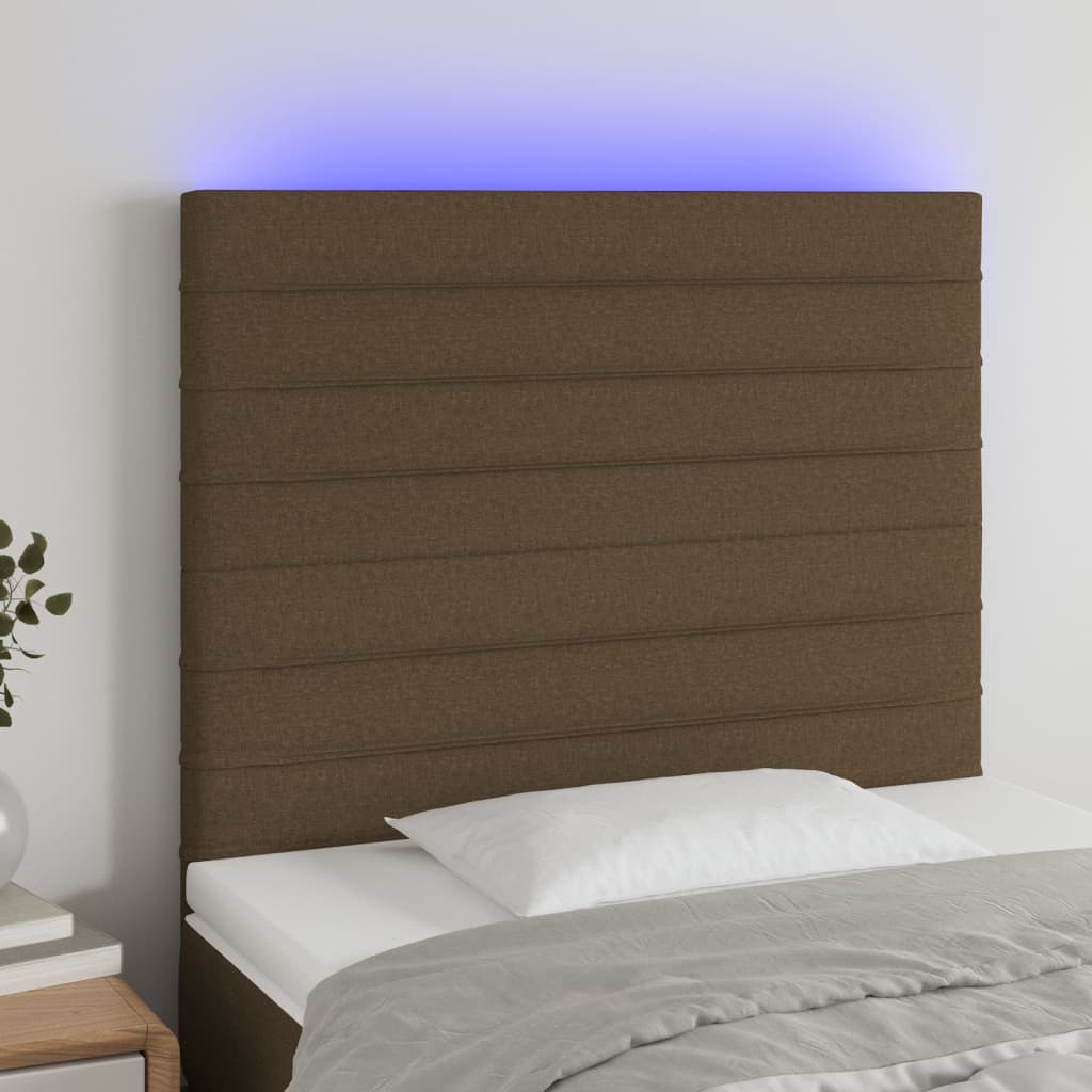 sengegavl med LED-lys 90x5x118/128 cm stof mørkebrun