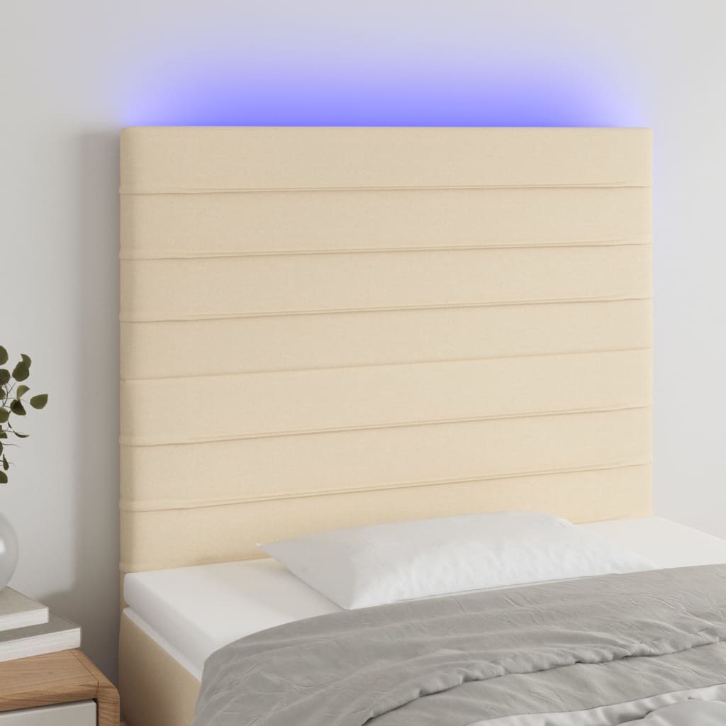 sengegavl med LED-lys 90x5x118/128 cm stof cremefarvet