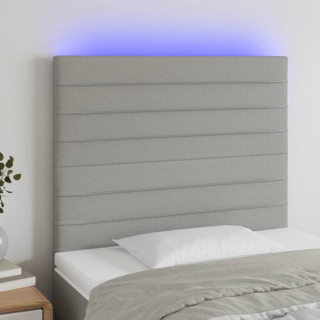 sengegavl med LED-lys 100x5x118/128 cm stof lysegrå
