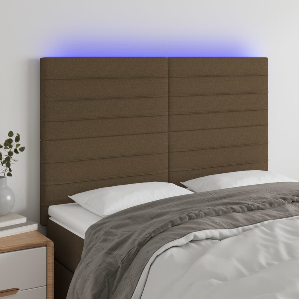 sengegavl med LED-lys 144x5x118/128 cm stof mørkebrun