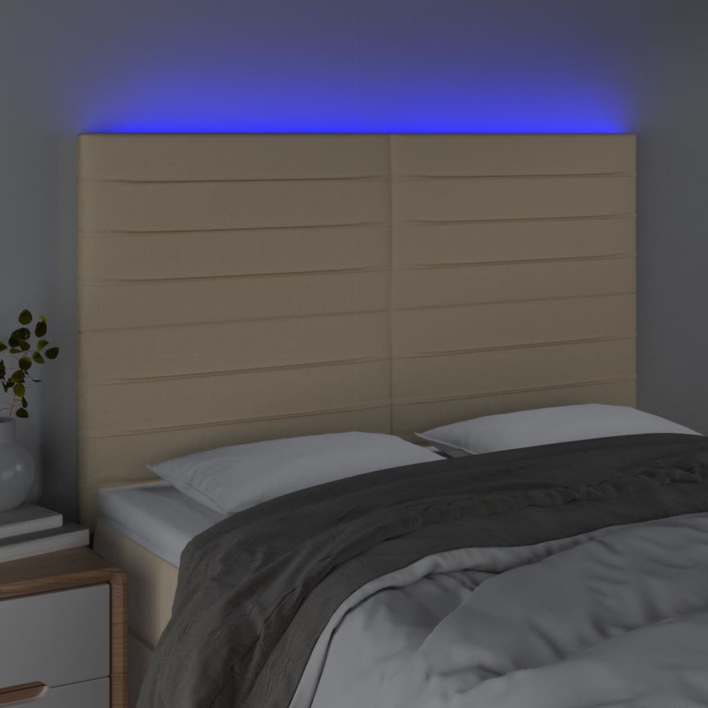 sengegavl med LED-lys 144x5x118/128 cm stof cremefarvet