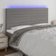 sengegavl med LED-lys 160x5x118/128 cm stof mørkegrå