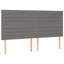 sengegavl med LED-lys 180x5x118/128 cm stof mørkegrå
