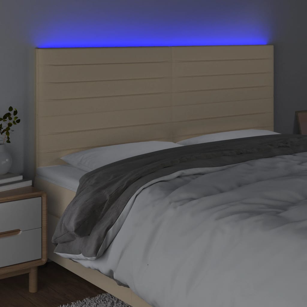 sengegavl med LED-lys 200x5x118/128 cm stof Cremefarvet