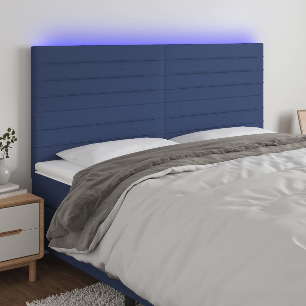 sengegavl med LED-lys 200x5x118/128 cm stof blå