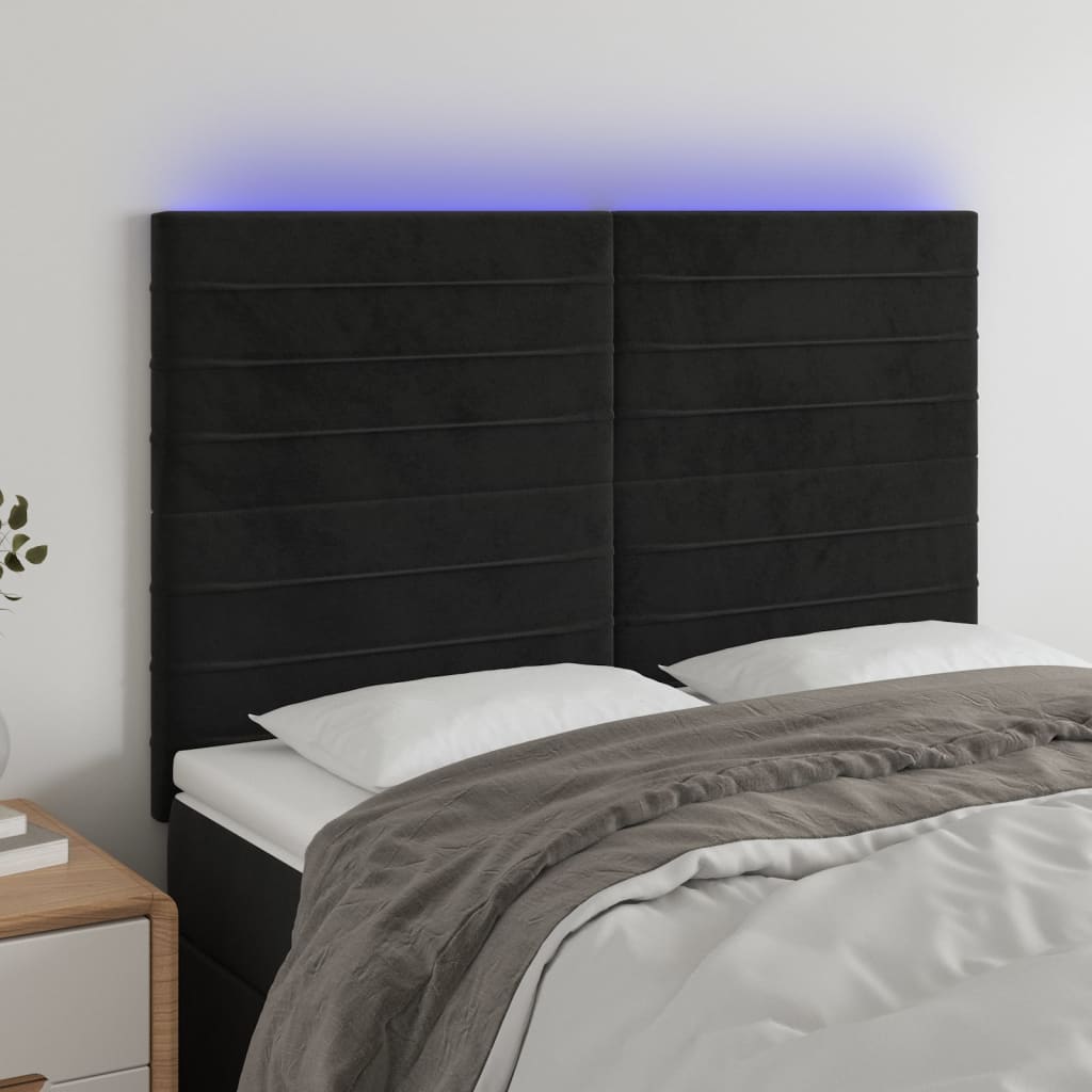 sengegavl med LED-lys 144x5x118/128 cm fløjl sort