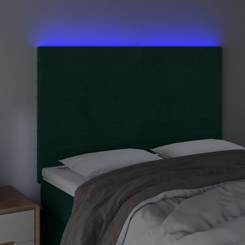 sengegavl med LED-lys 144x5x118/128 cm fløjl mørkegrøn