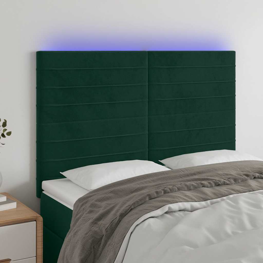 sengegavl med LED-lys 144x5x118/128 cm fløjl mørkegrøn