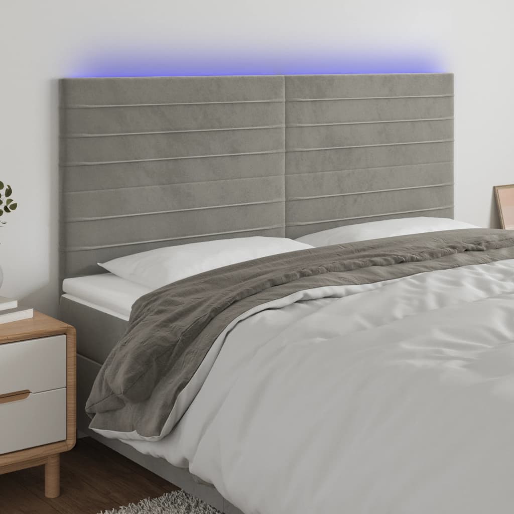 sengegavl med LED-lys 160x5x118/128 cm fløjl lysegrå