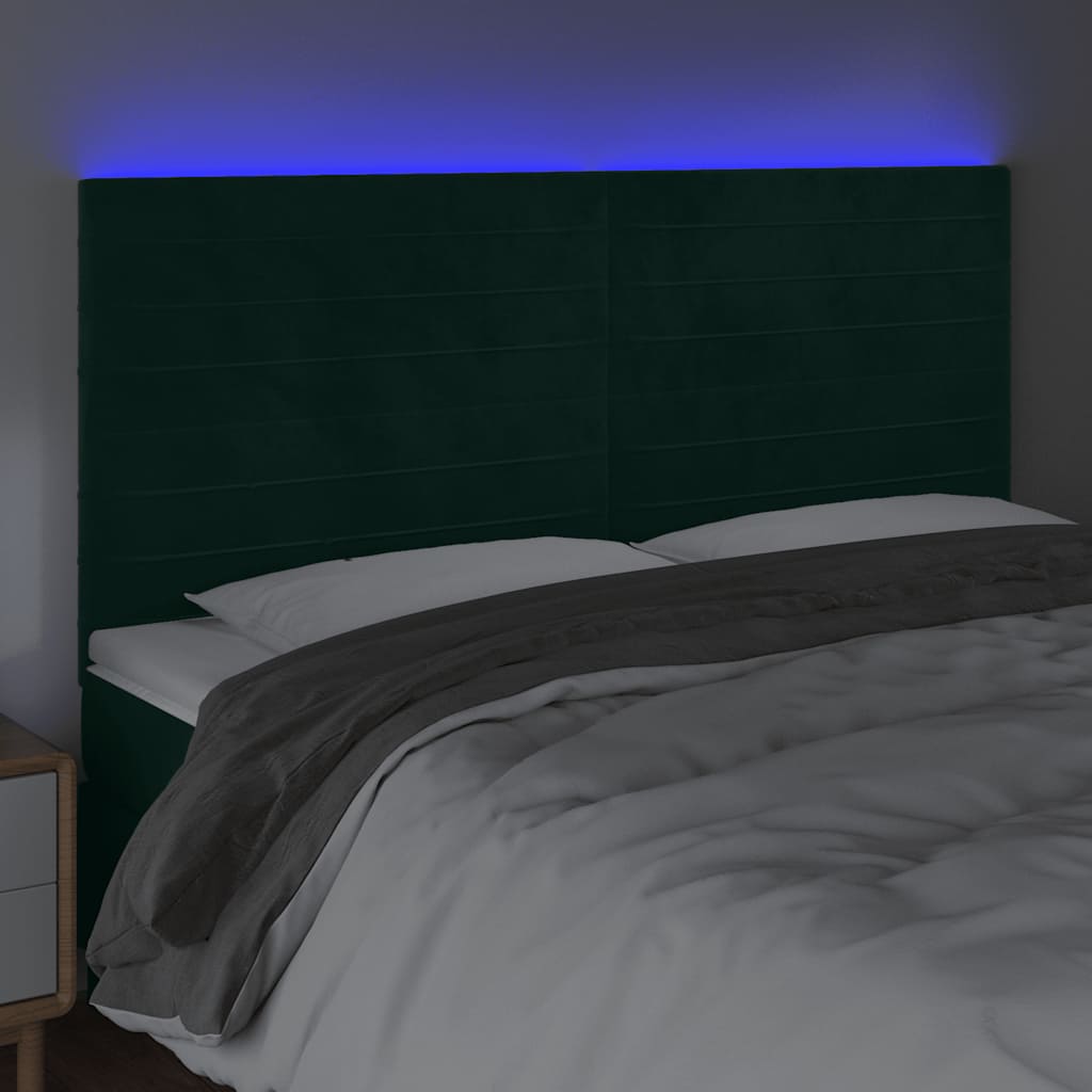 sengegavl med LED-lys 160x5x118/128 cm fløjl mørkegrøn