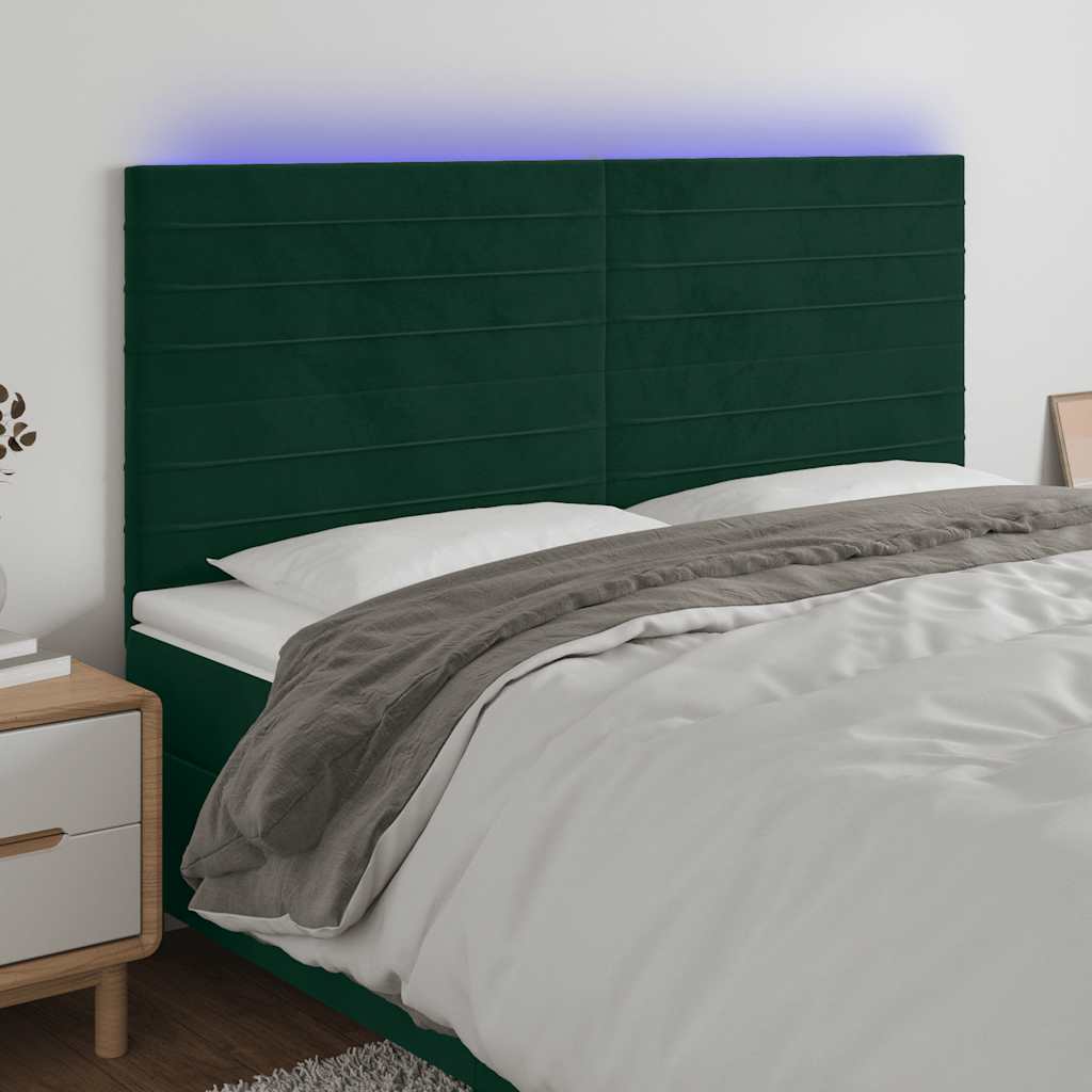 sengegavl med LED-lys 160x5x118/128 cm fløjl mørkegrøn