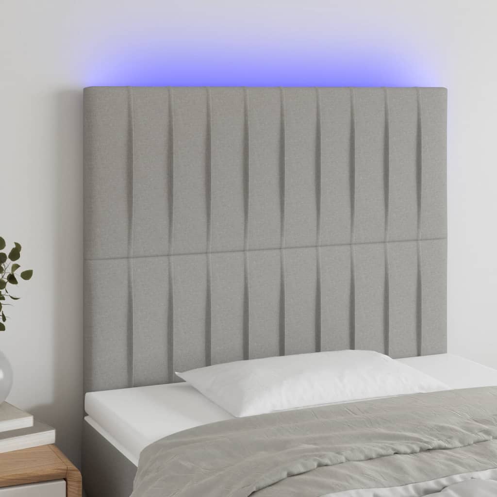 sengegavl med LED-lys 100x5x118/128 cm stof lysegrå