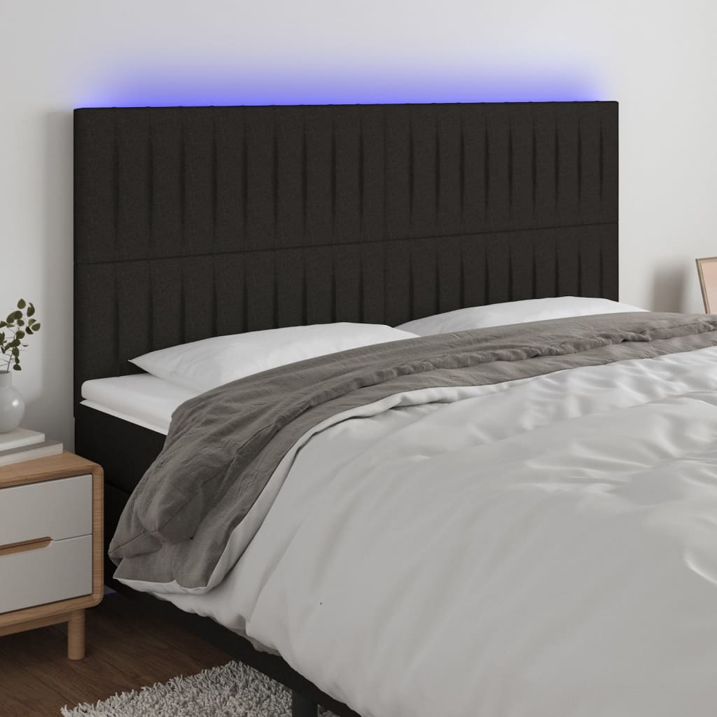 sengegavl med LED-lys 180x5x118/128 cm stof sort