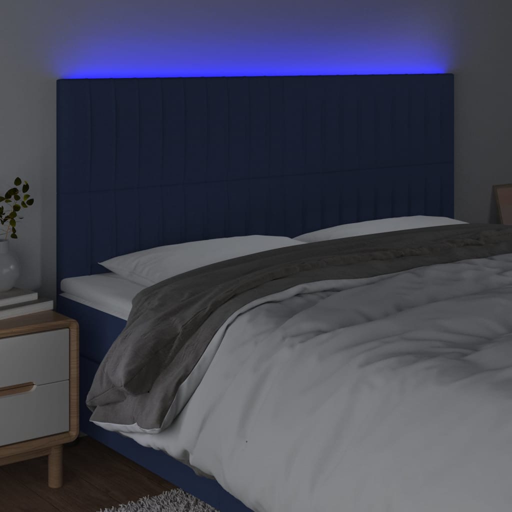 sengegavl med LED-lys 200x5x118/128 cm stof blå