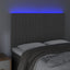 sengegavl med LED-lys 144x5x118/128 cm fløjl mørkegrå