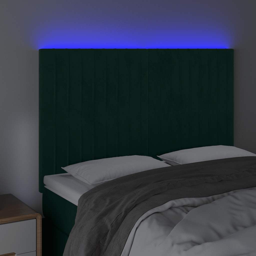 sengegavl med LED-lys 144x5x118/128 cm fløjl mørkegrøn