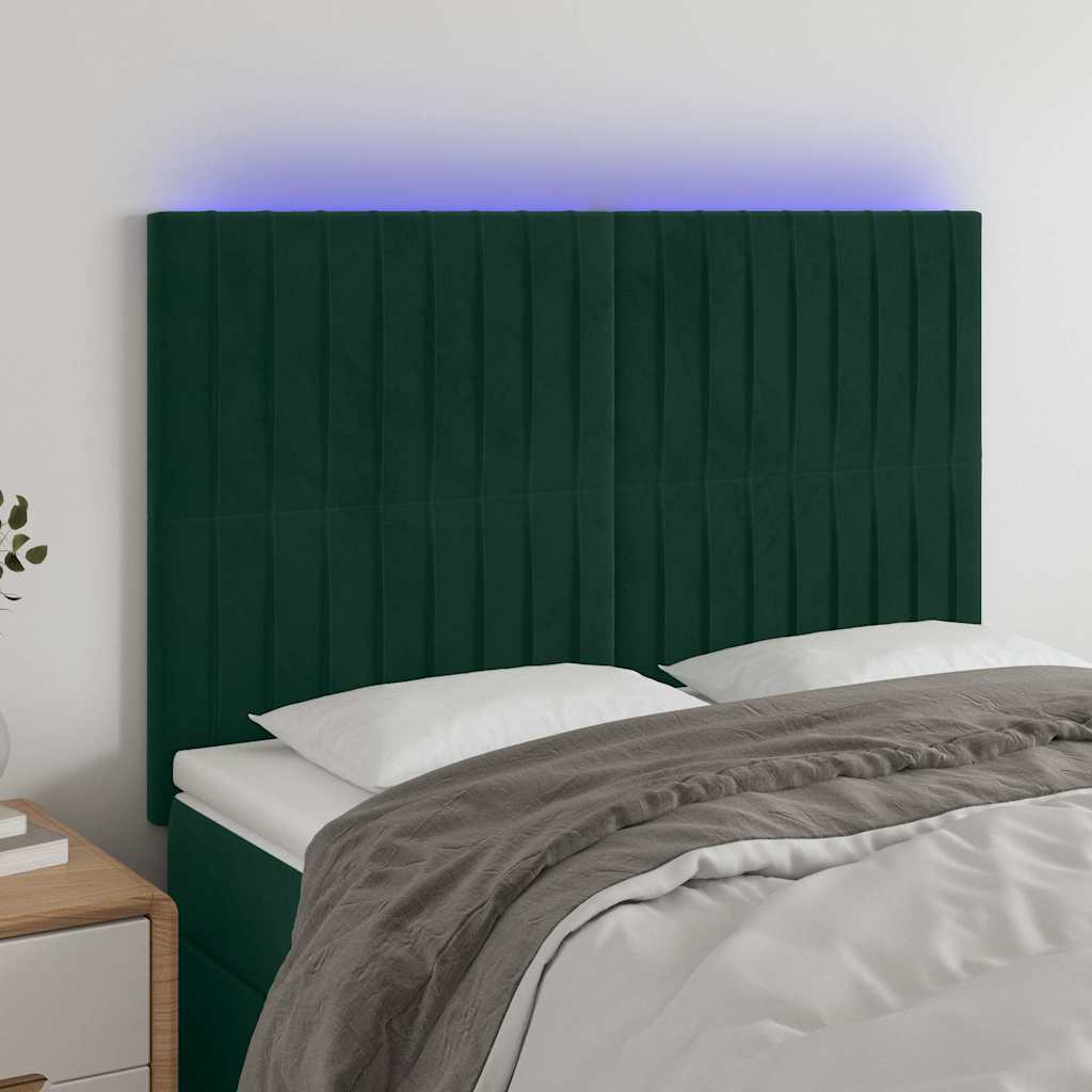 sengegavl med LED-lys 144x5x118/128 cm fløjl mørkegrøn