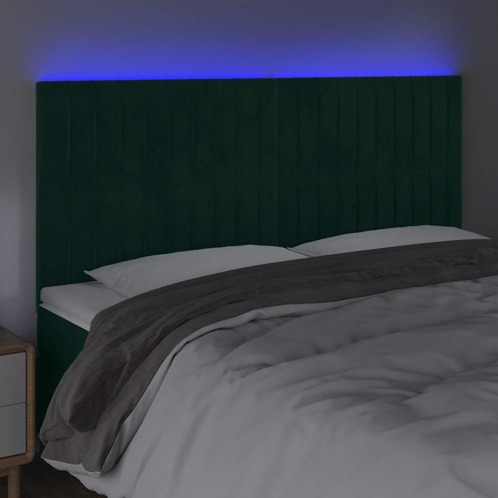 sengegavl med LED-lys 160x5x118/128 cm fløjl mørkegrøn