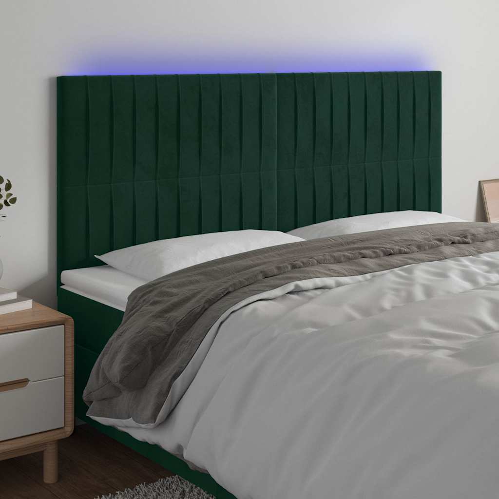sengegavl med LED-lys 160x5x118/128 cm fløjl mørkegrøn