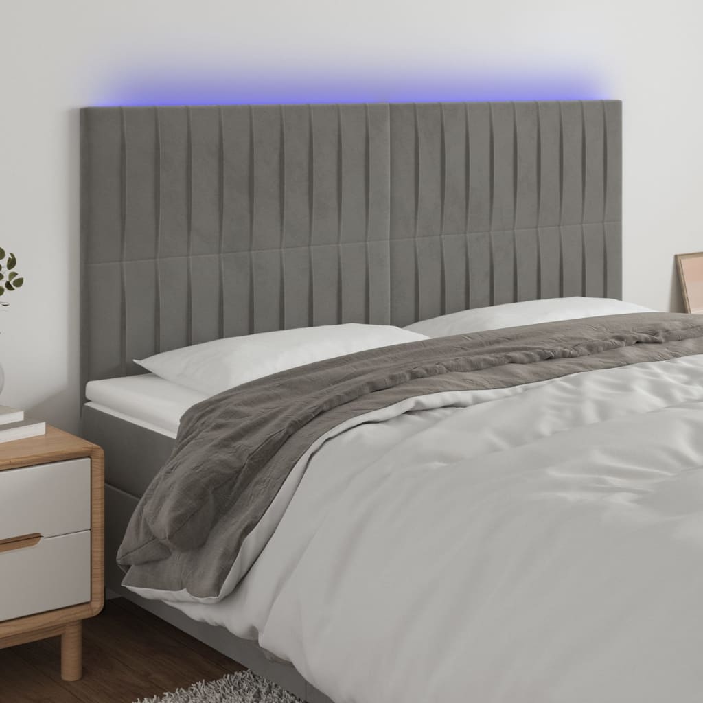 sengegavl med LED-lys 180x5x118/128 cm fløjl lysegrå
