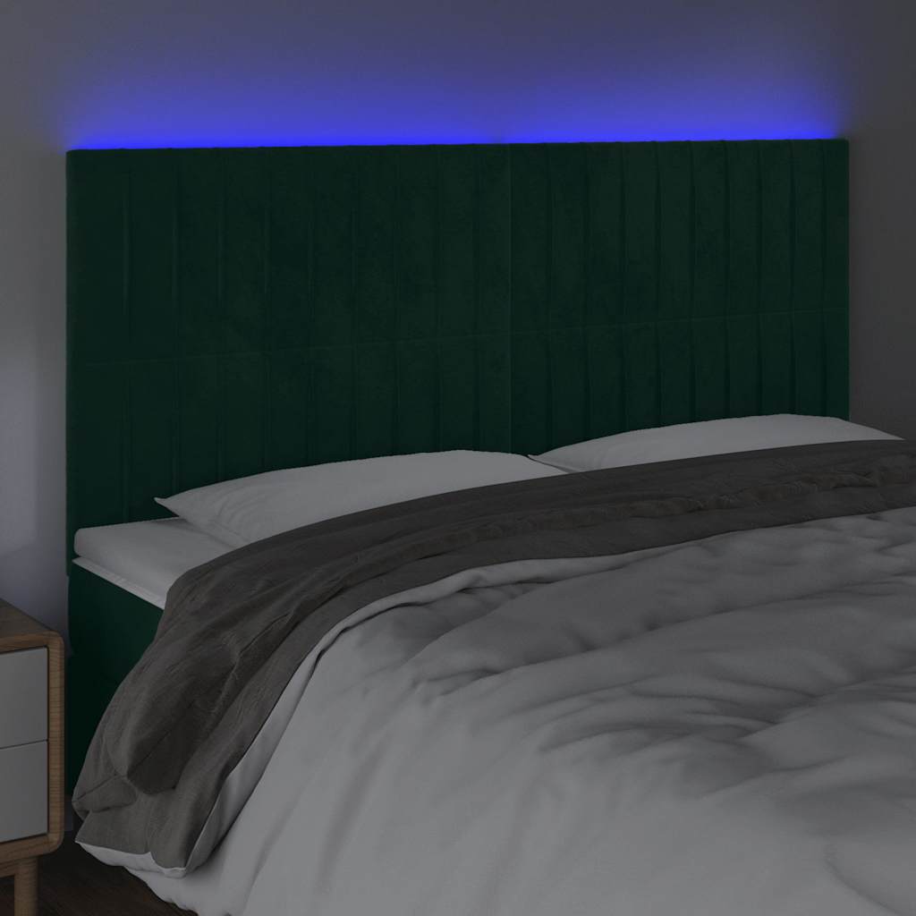 sengegavl med LED-lys 180x5x118/128 cm fløjl mørkegrøn