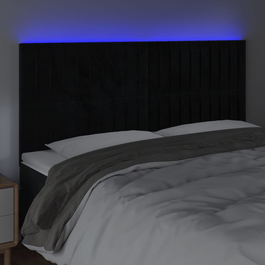 sengegavl med LED-lys 200x5x118/128 cm fløjl sort
