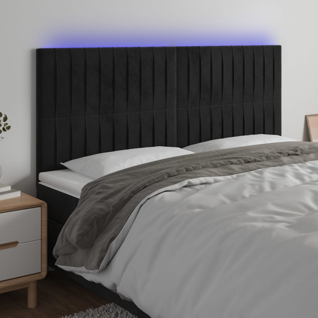 sengegavl med LED-lys 200x5x118/128 cm fløjl sort