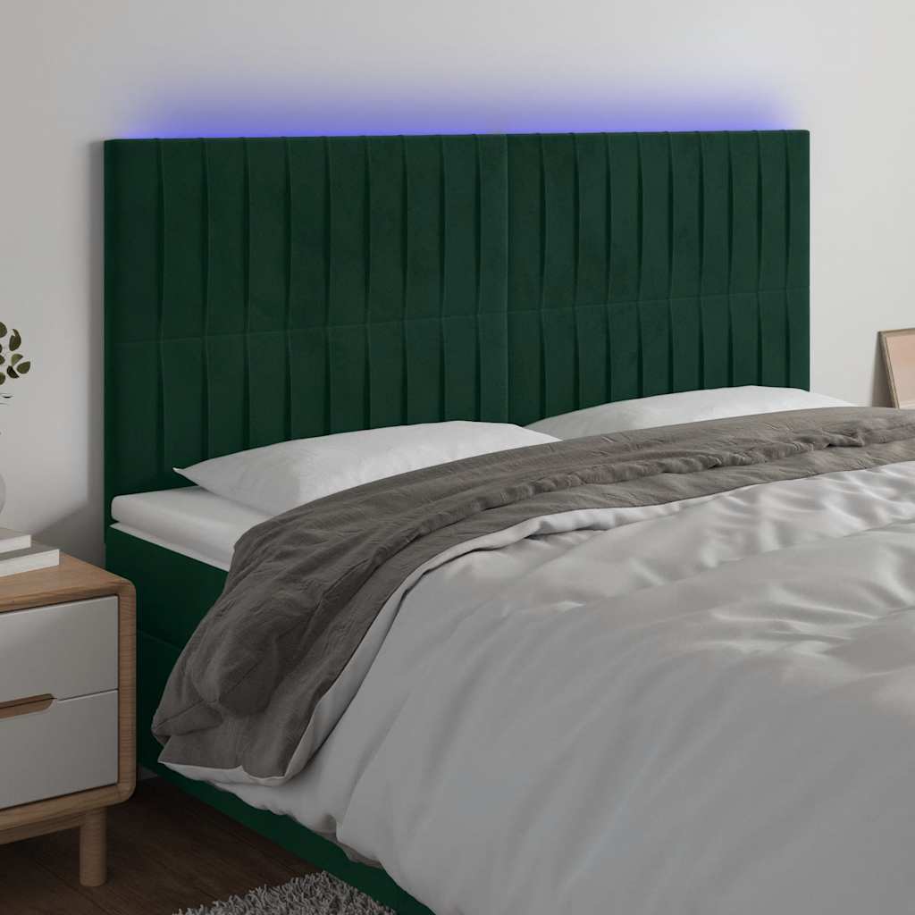 sengegavl med LED-lys 200x5x118/128 cm fløjl mørkegrøn