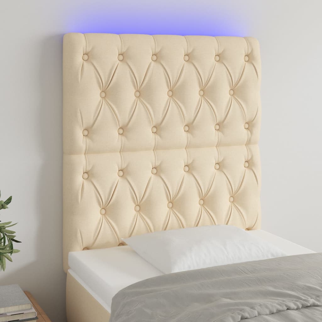sengegavl med LED-lys 80x7x118/128 cm stof cremefarvet