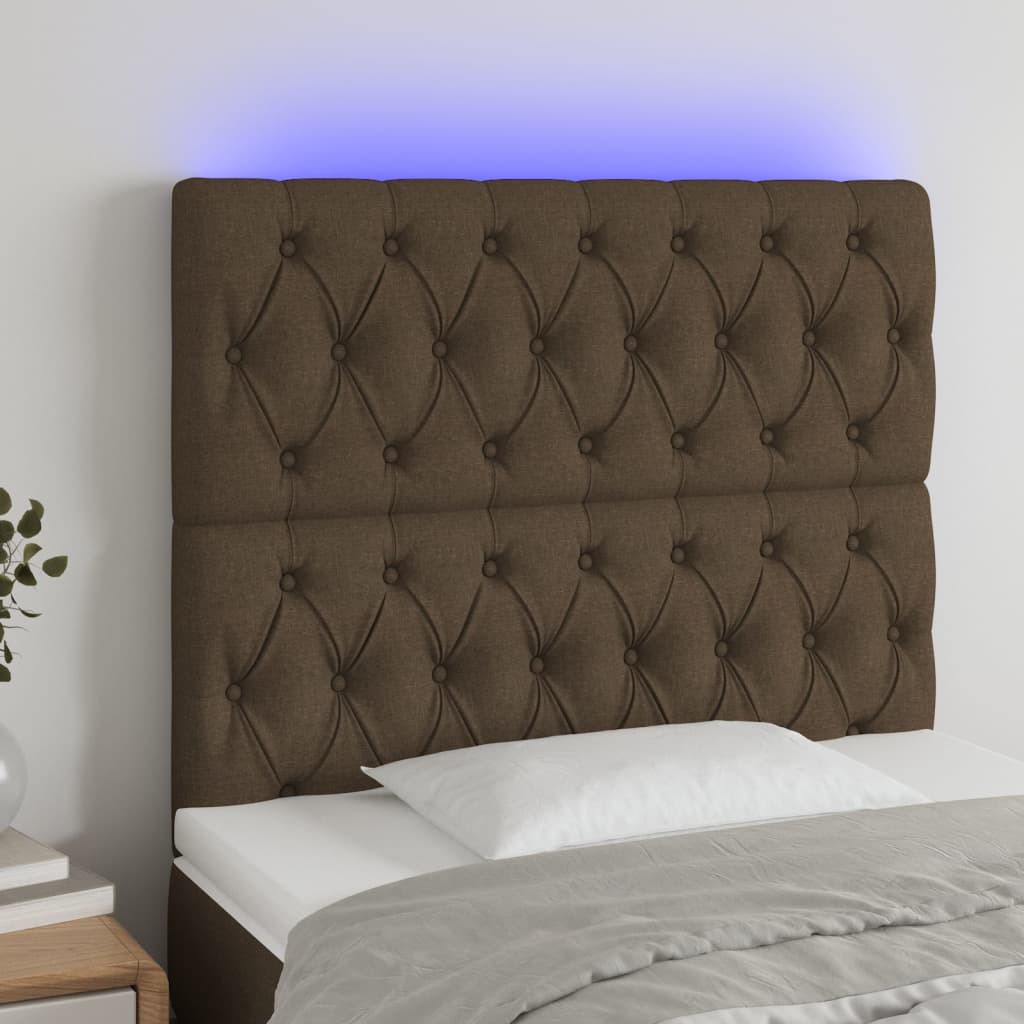 sengegavl med LED-lys 90x7x118/128 cm stof mørkebrun