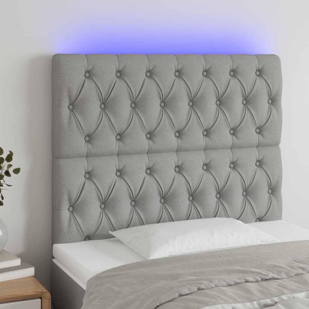 sengegavl med LED-lys 100x7x118/128 cm stof lysegrå