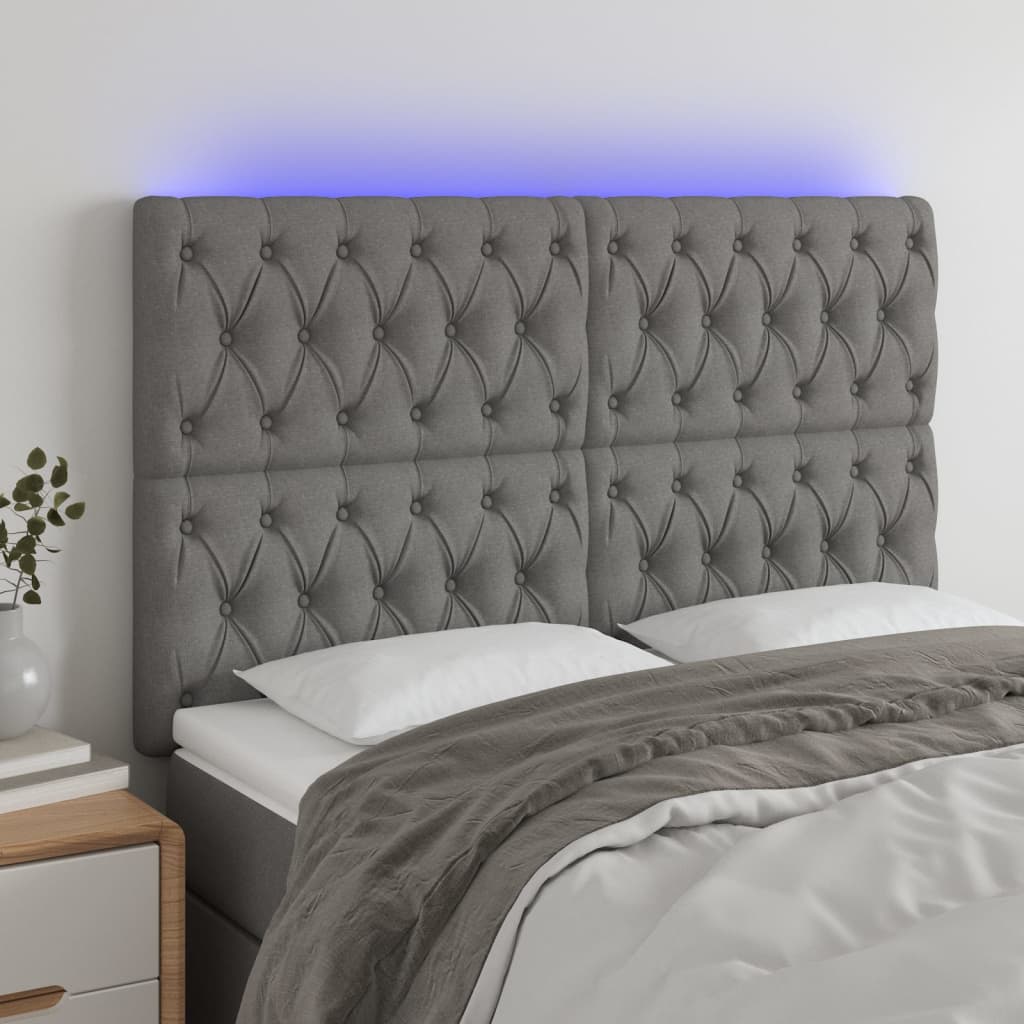 sengegavl med LED-lys 144x7x118/128 cm stof mørkegrå