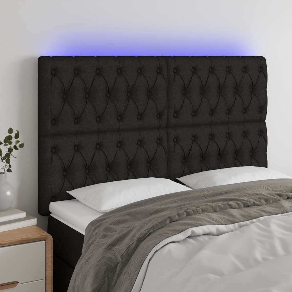sengegavl med LED-lys 144x7x118/128 cm stof sort