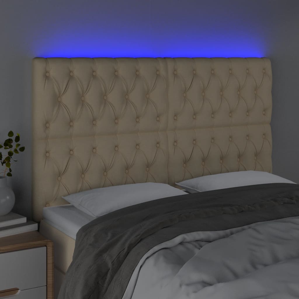 sengegavl med LED-lys 160x7x118/128 cm stof cremefarvet