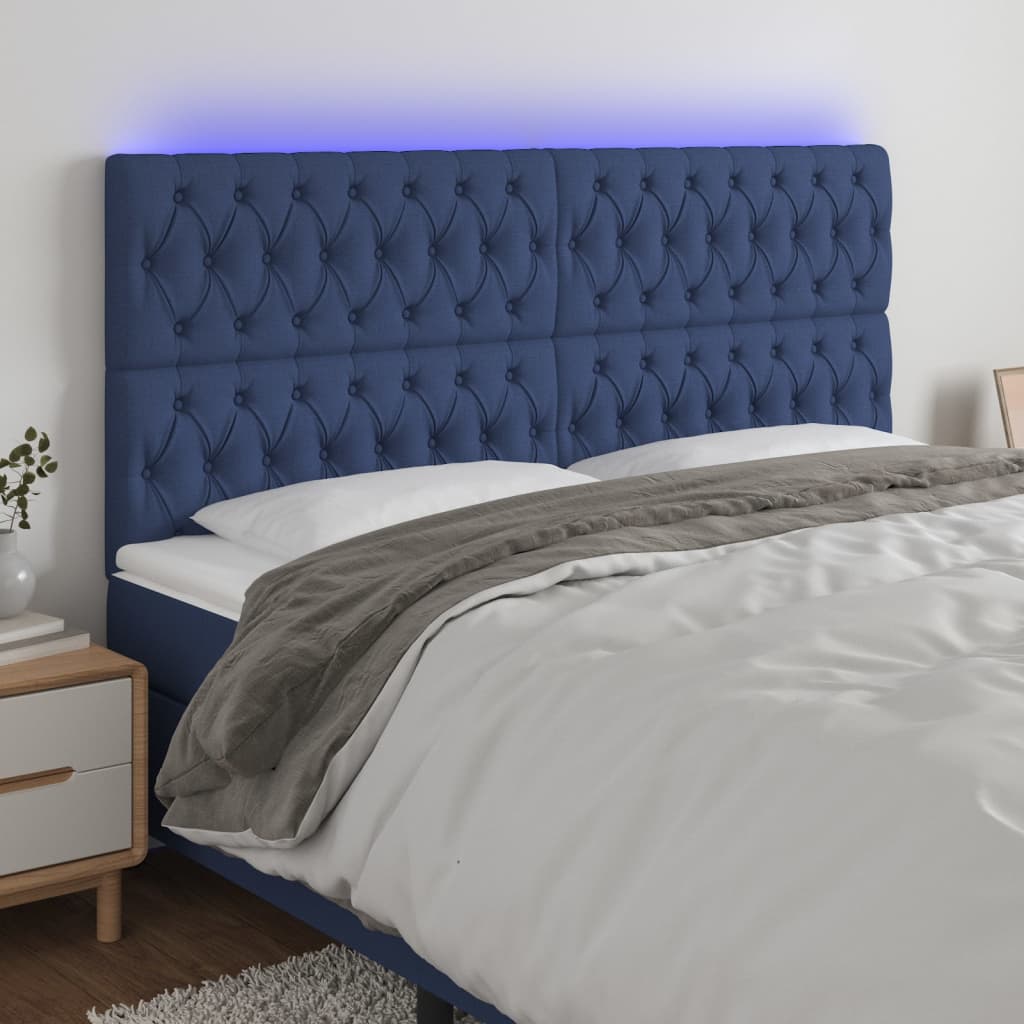 sengegavl med LED-lys 180x7x118/128 cm stof blå