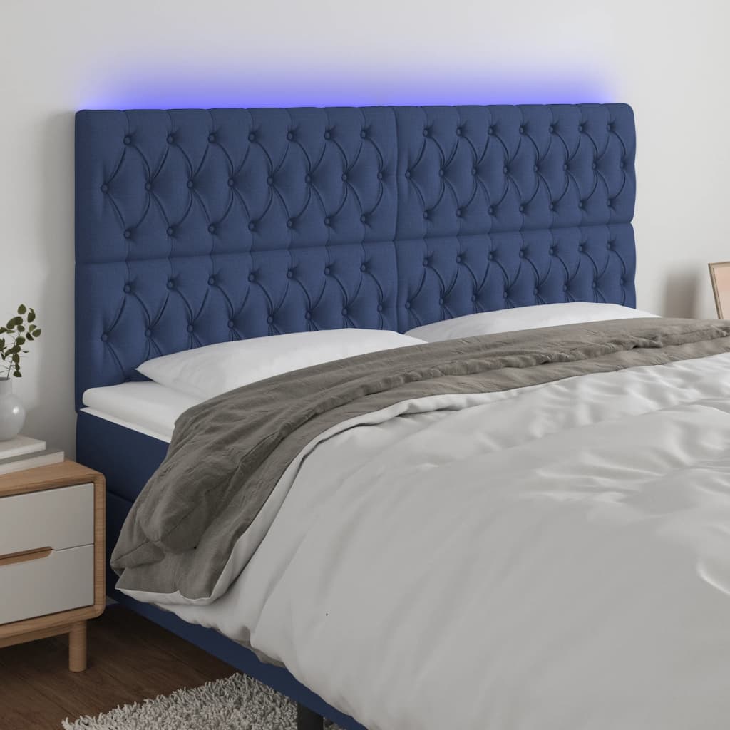 sengegavl med LED-lys 200x7x118/128 cm stof blå
