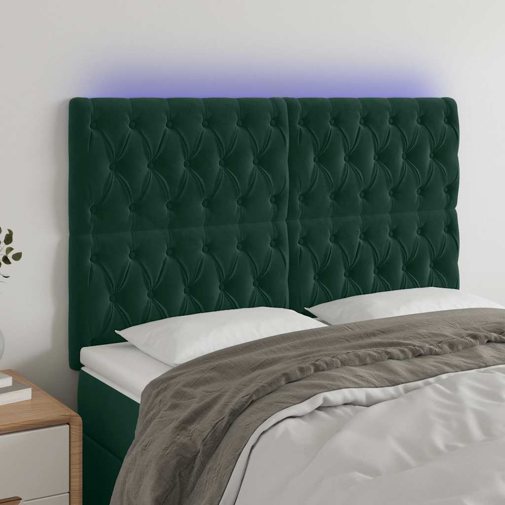 sengegavl med LED-lys 144x7x118/128 cm fløjl mørkegrøn