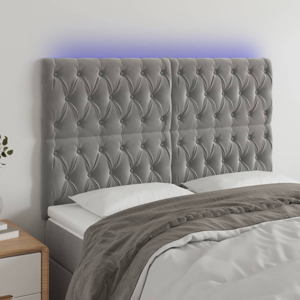 sengegavl med LED-lys 160x7x118/128 cm fløjl lysegrå