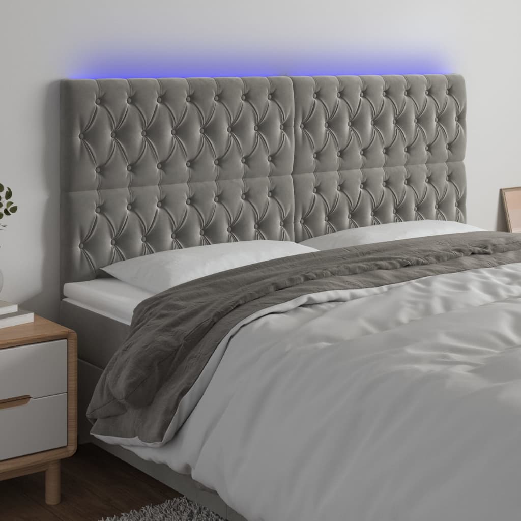 sengegavl med LED-lys 180x7x118/128 cm fløjl lysegrå